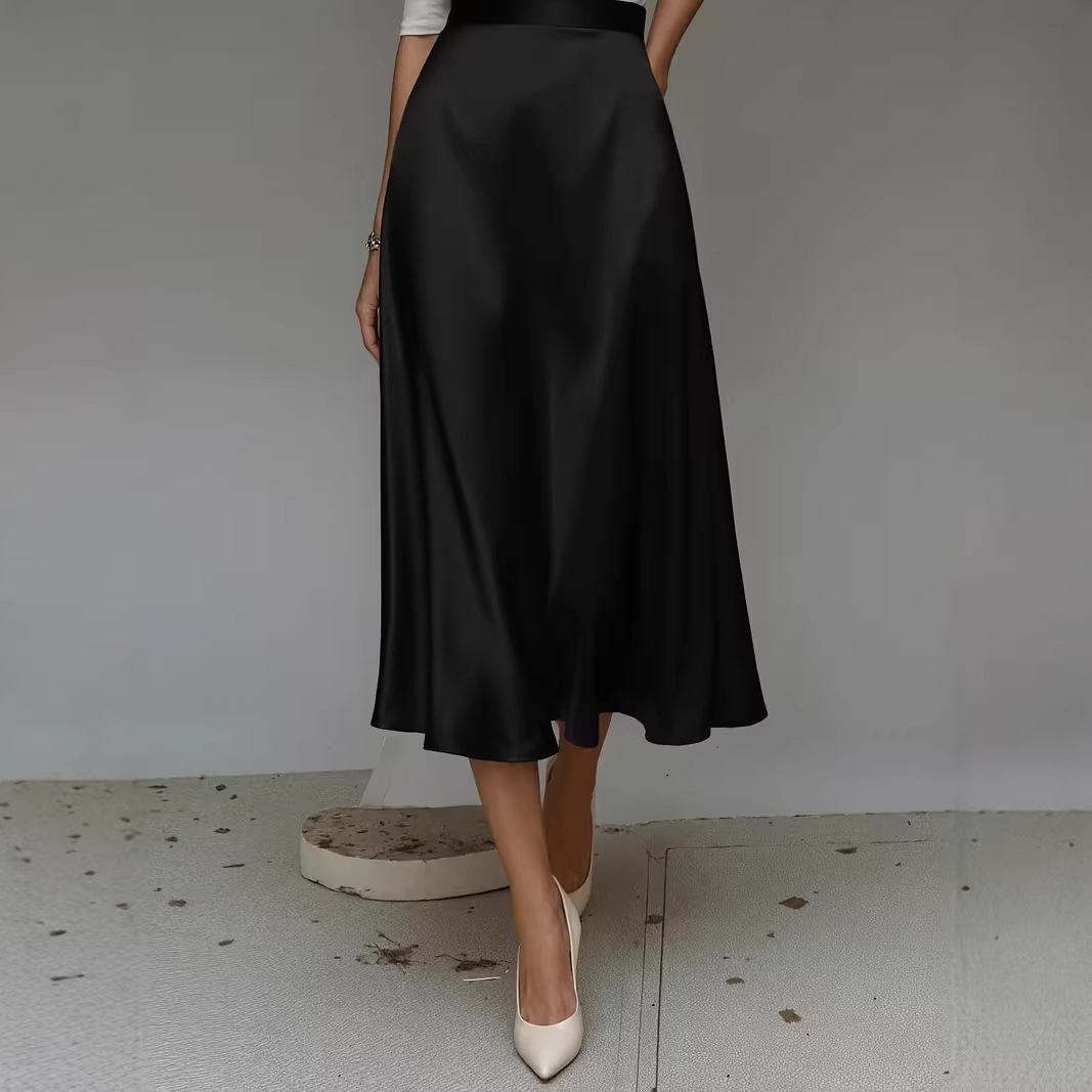 Women's satin solid color skirt close-up fabric texture lustrous finish mid-length