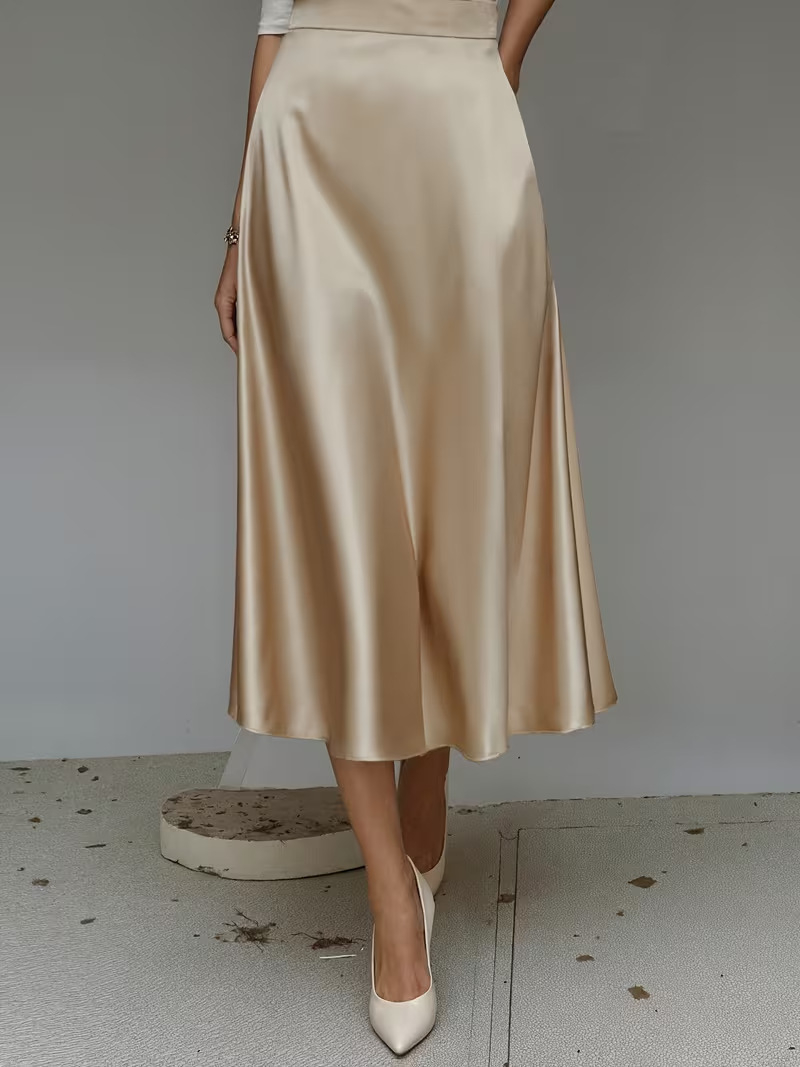 Women's satin mid-length skirt side view solid color slight stretch elegant silhouette