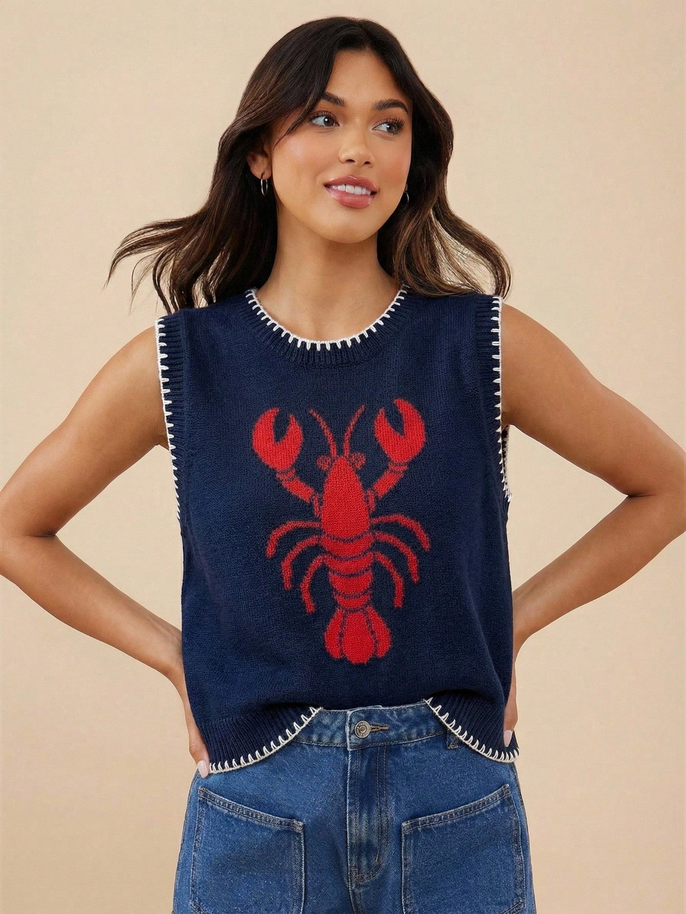 Women's embroidered sleeveless knit vest in Navy Blue – detail shot showing jacquard texture