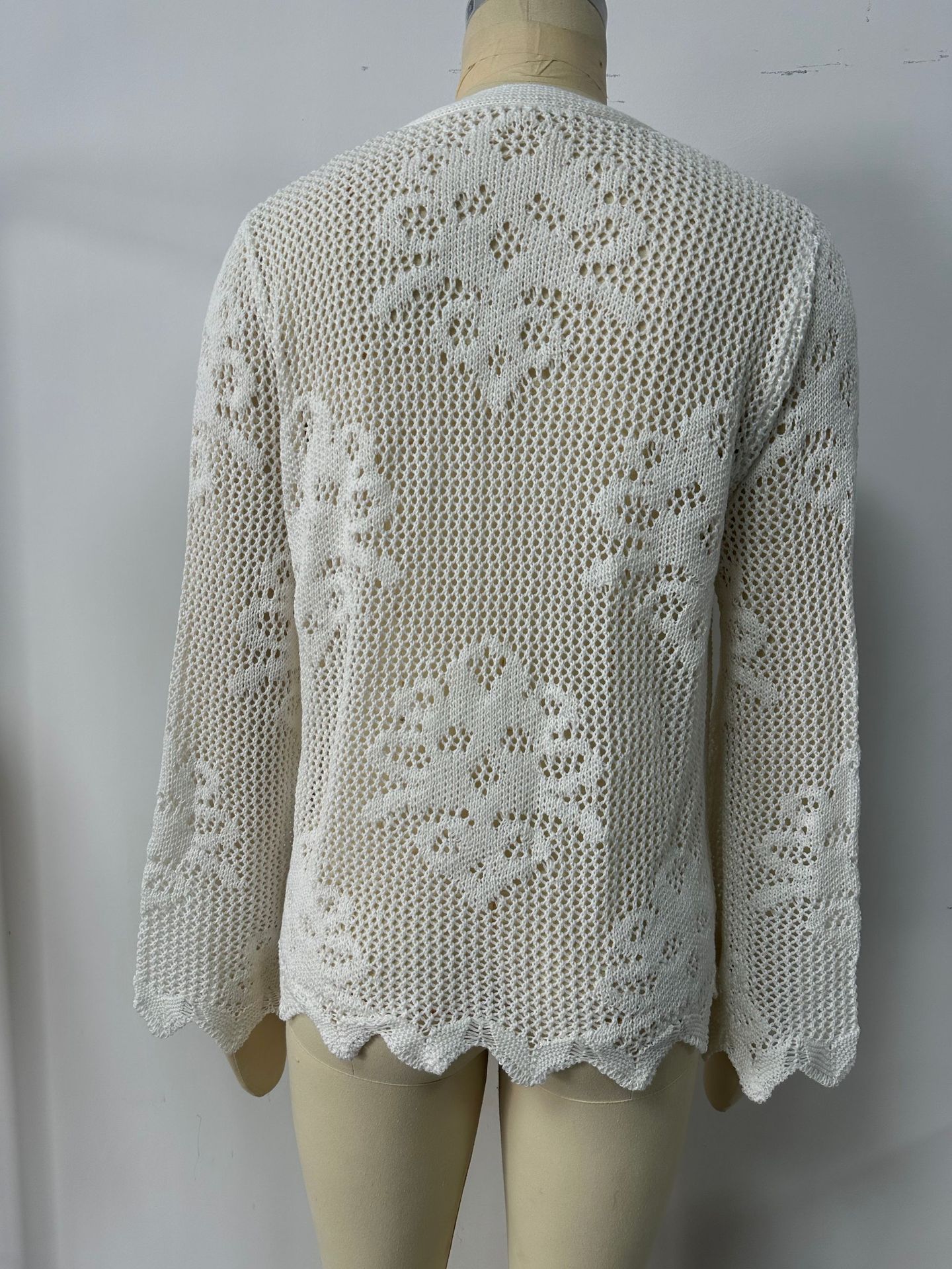Women's lace-up knit cardigan in Sky Blue – lifestyle photo showing fit and open knit texture detail