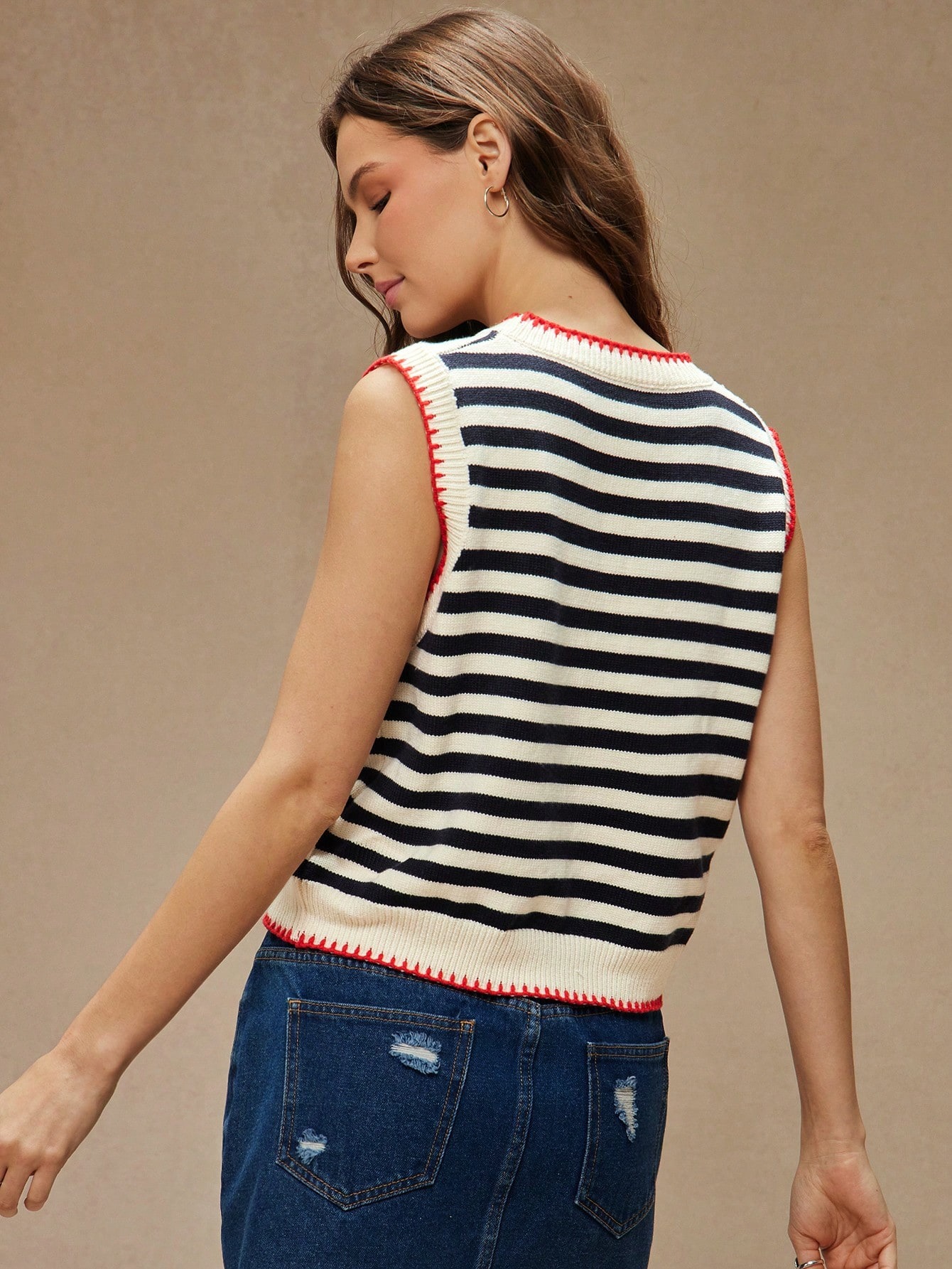 Women's knit vest in White Blue – evening styling tucked into midi skirt with heeled mules
