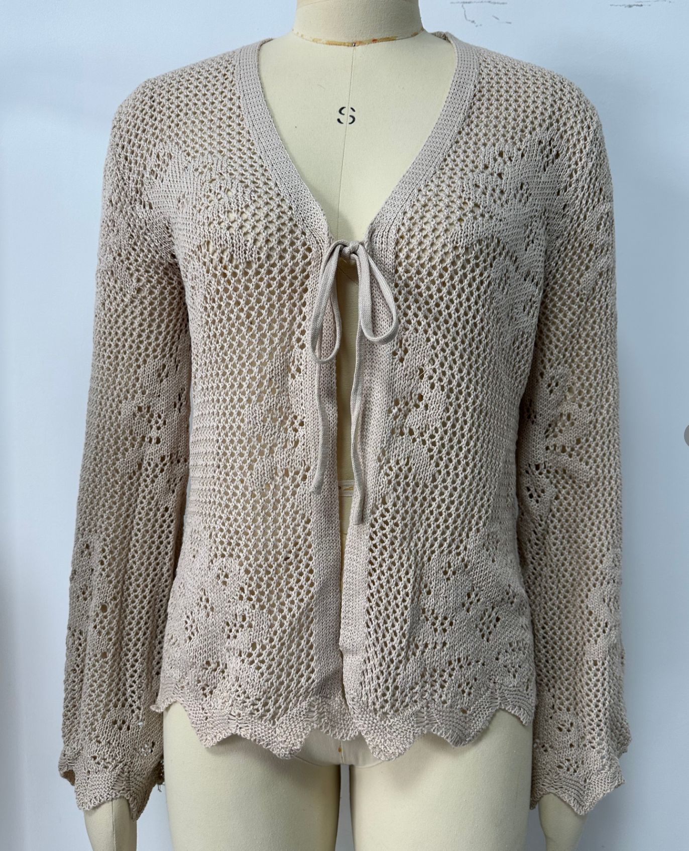 Women's hollow-out knit cardigan in all four colors – Black, Khaki, Sky Blue, White side by side