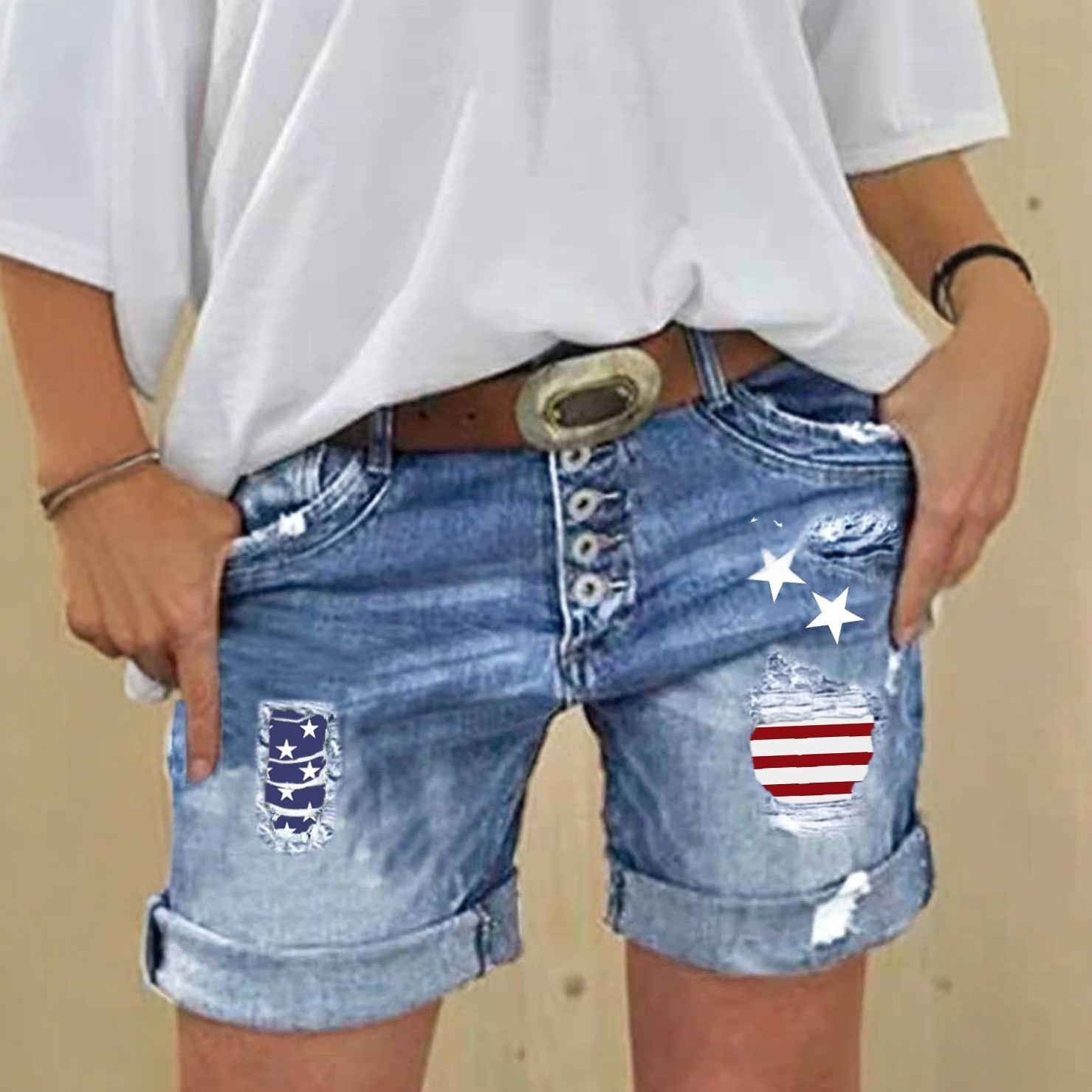 Figure-flattering Slimming Ripped Patchwork-print Stretch Denim Shorts