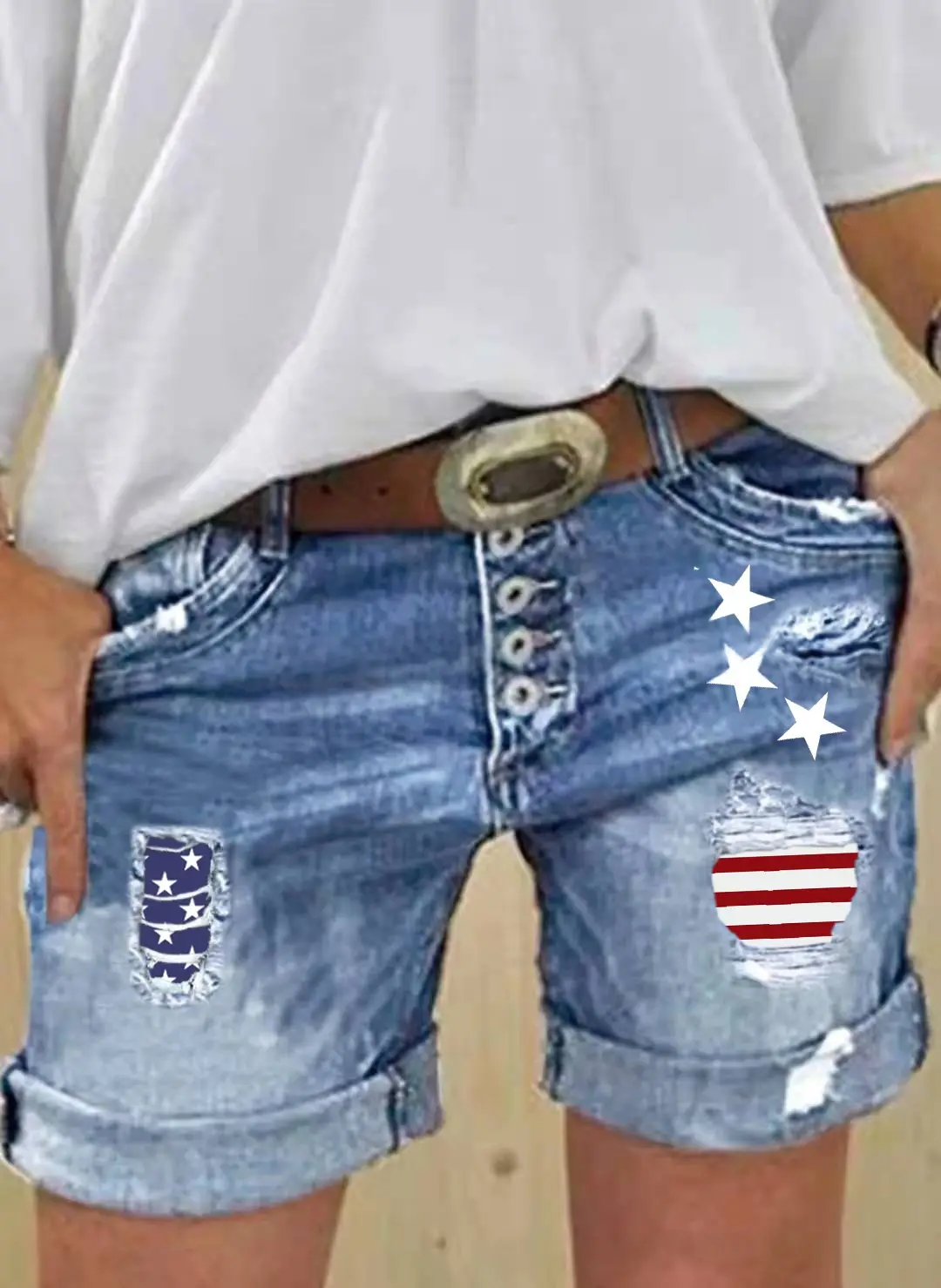 Figure-flattering Slimming Ripped Patchwork-print Stretch Denim Shorts