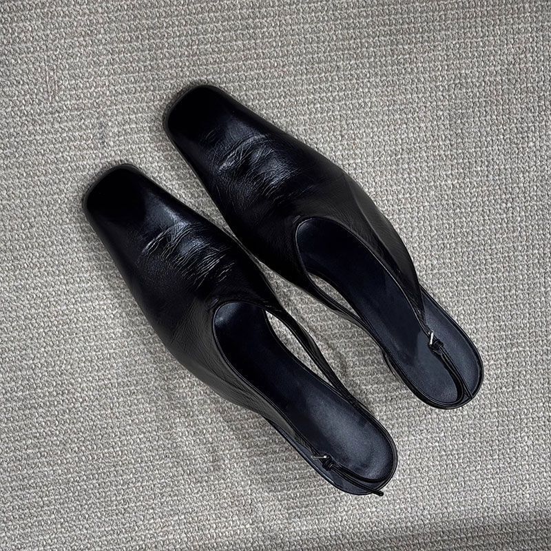 Baotou Sandals In Black Synthetic Leather — detail view 5