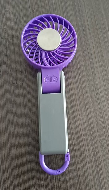 A Small Portable Hand Fan image 2