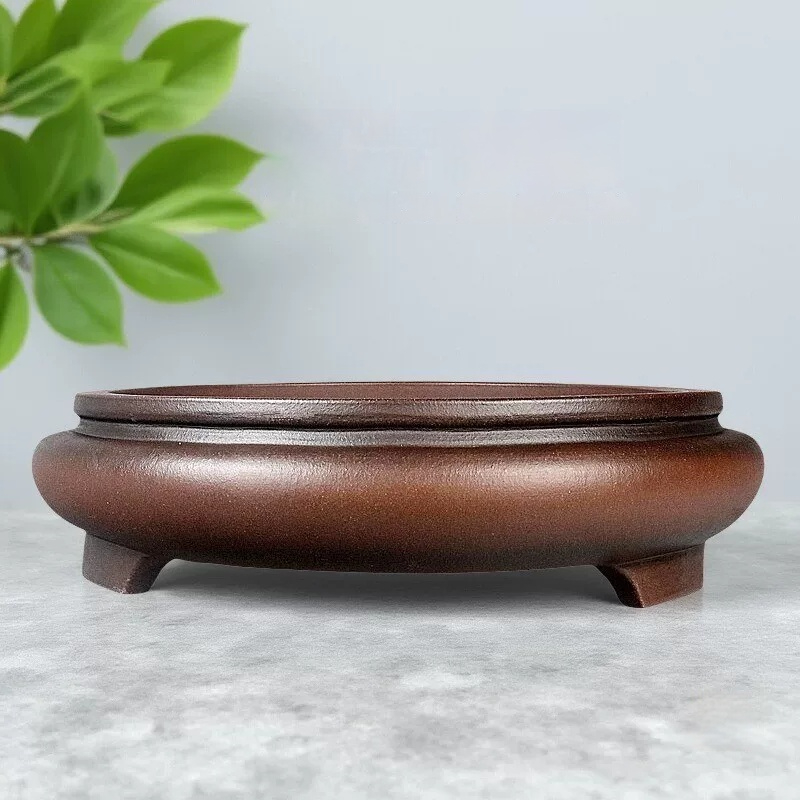 Round Purple Clay Flower Pot Adorned With Pine Cypress And Magpie Motifs