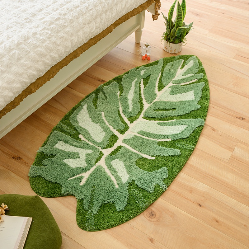 Green Plants With Tufted Leaves Create A Cozy Atmosphere By The Bedroom Bed