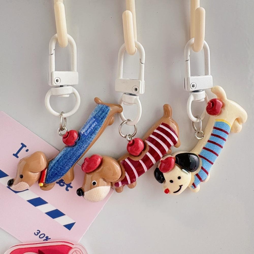 Accesoriu pentru păr sub formă de breloc cu dachshund