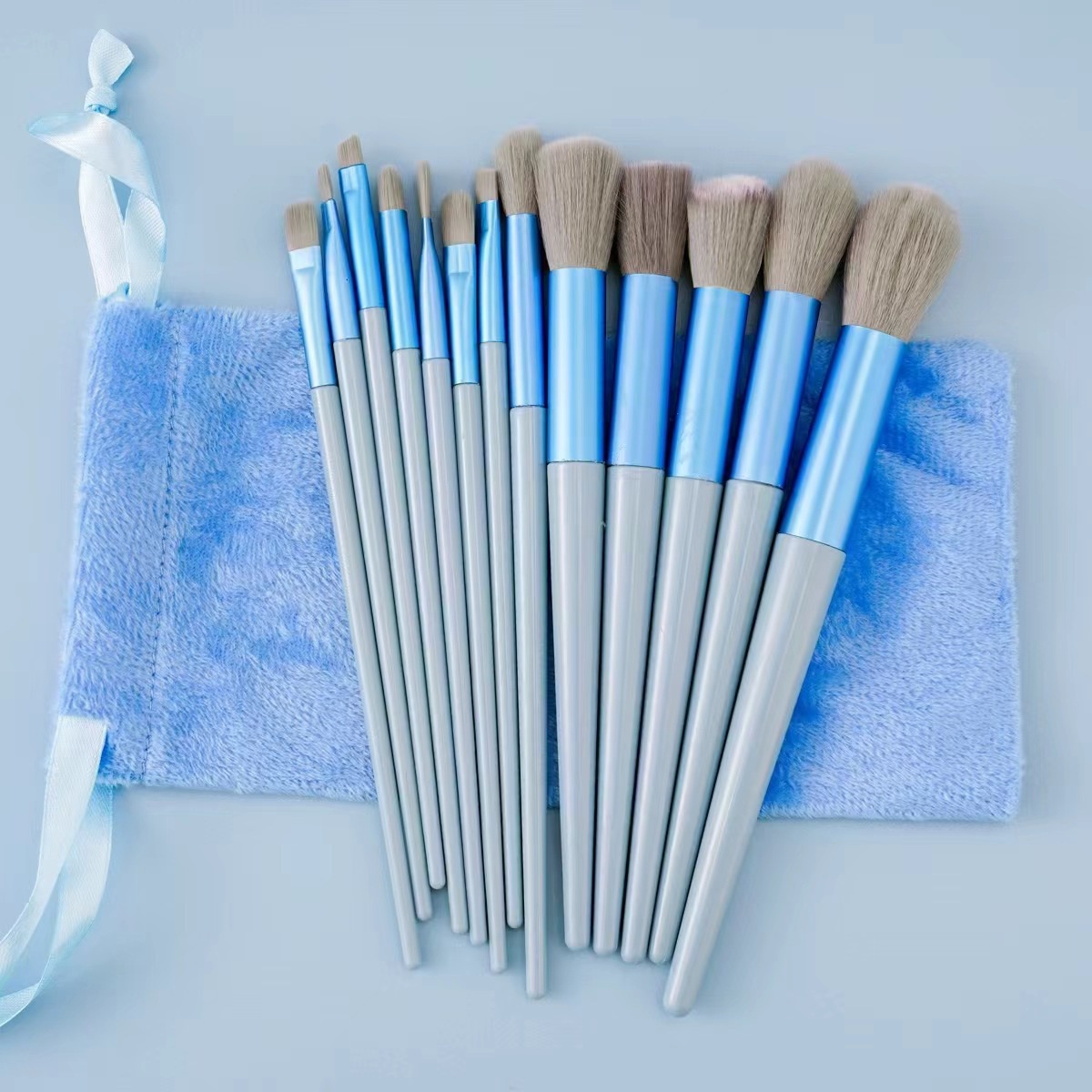 A Complete Set Of 13 Makeup Brushes