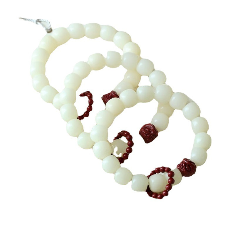 White Bodhi Seed Bead Bracelet With Lion Dance Design