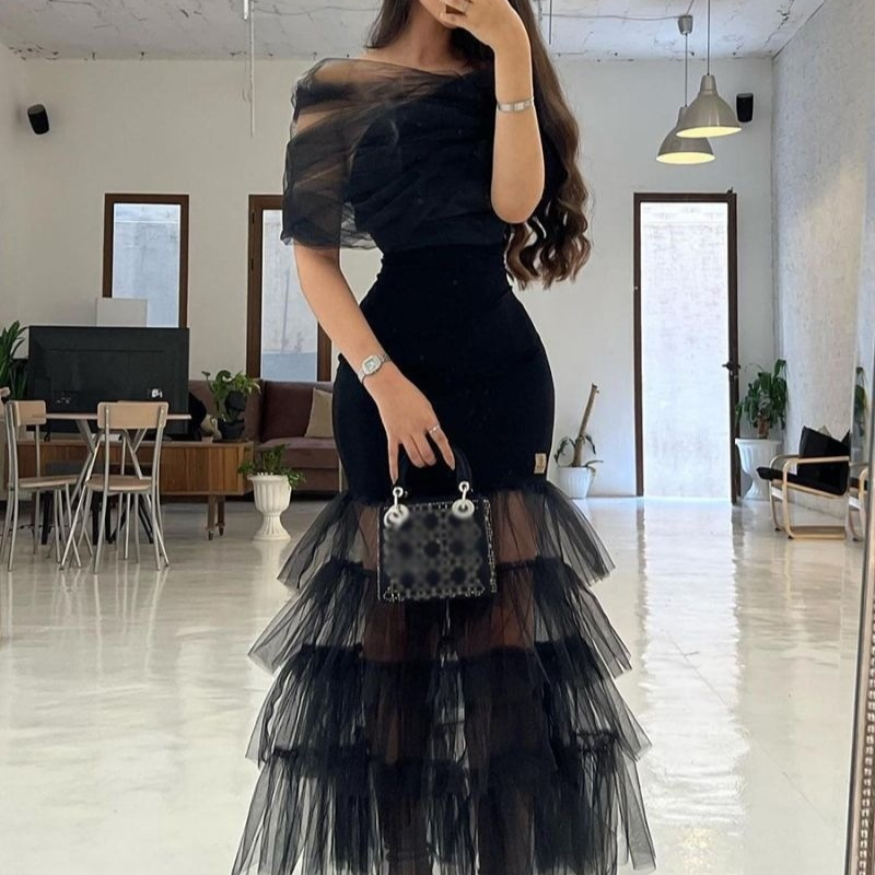 Long Dress With Mesh Paneling And A Strapless Evening Gown Style