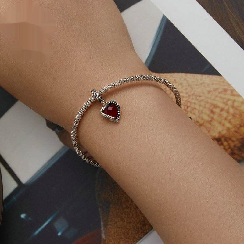 Silver-Plated Heart Pendant Bracelet