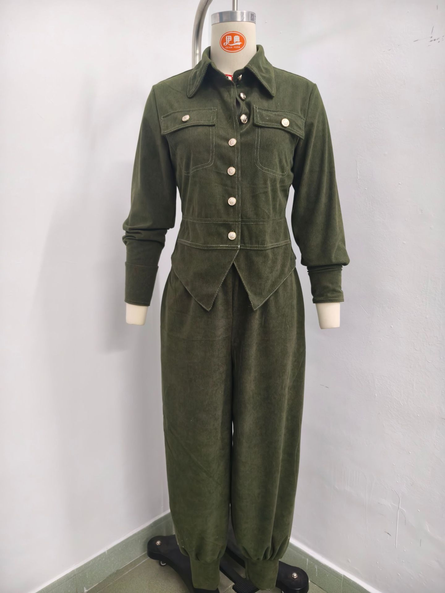 Source reference for the corduroy-style jacket and matching pants set
