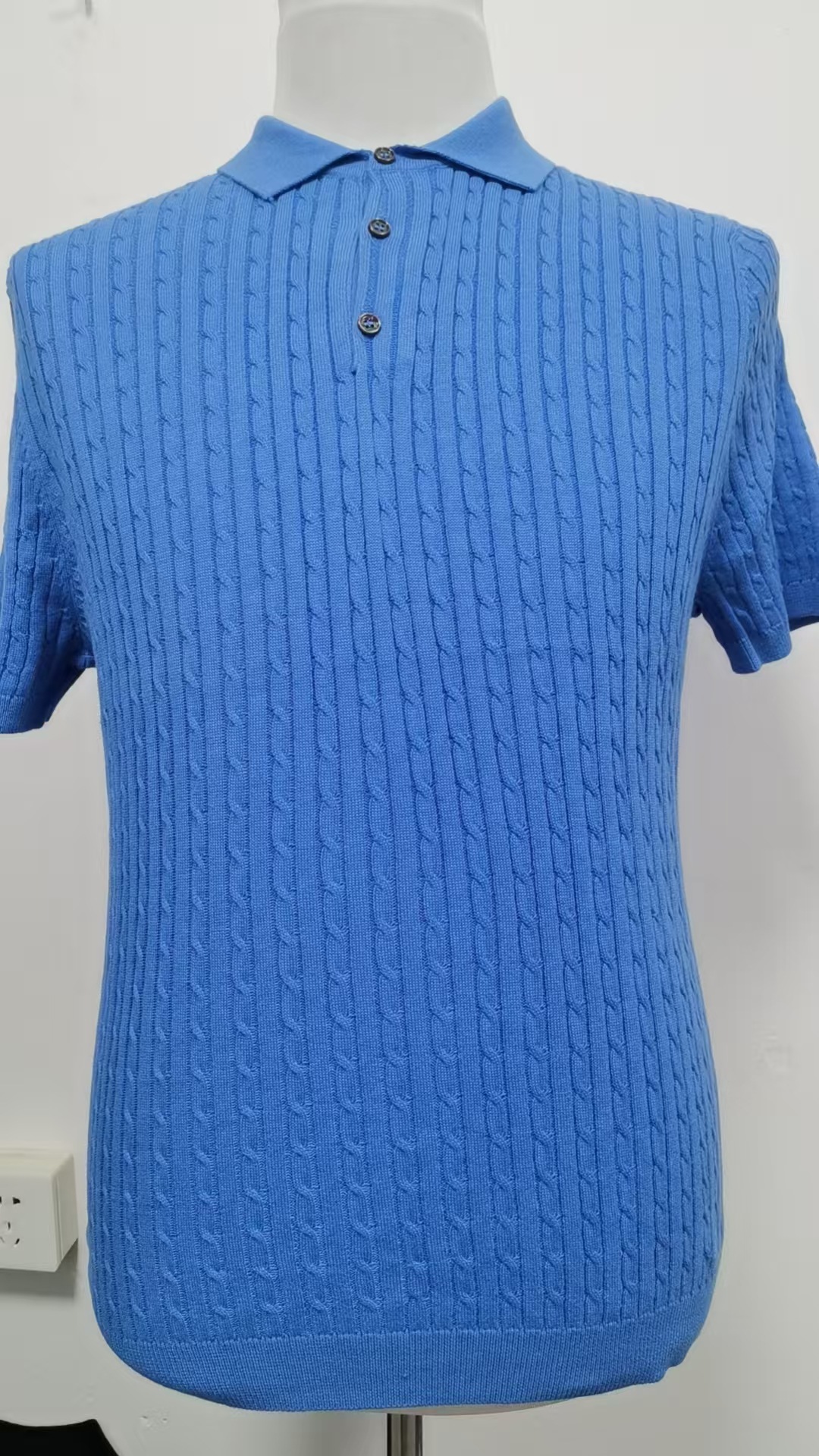 Men's Cable-Knit Short-Sleeve Polo Shirt - blue front view showing collar and knit texture